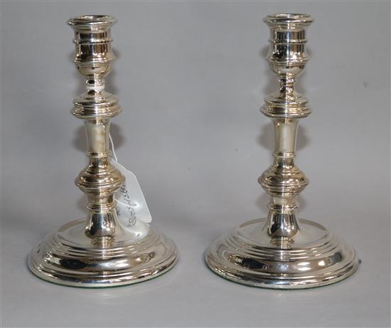 A pair of 1980s Georgian style silver candlesticks by William Walters Antiques Ltd, London, 1983, weighted.